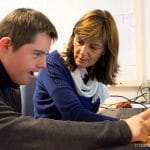 Photo de la logopédie - Dominique Lebrun avec un élève